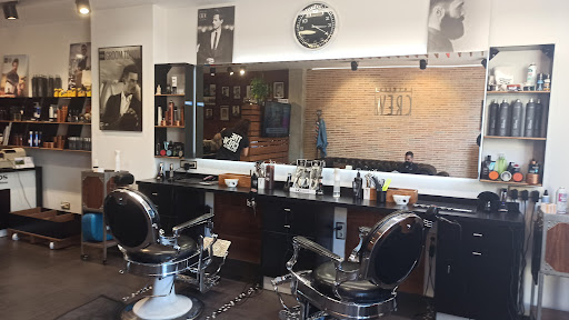 Moisés Peluqueros en Silla